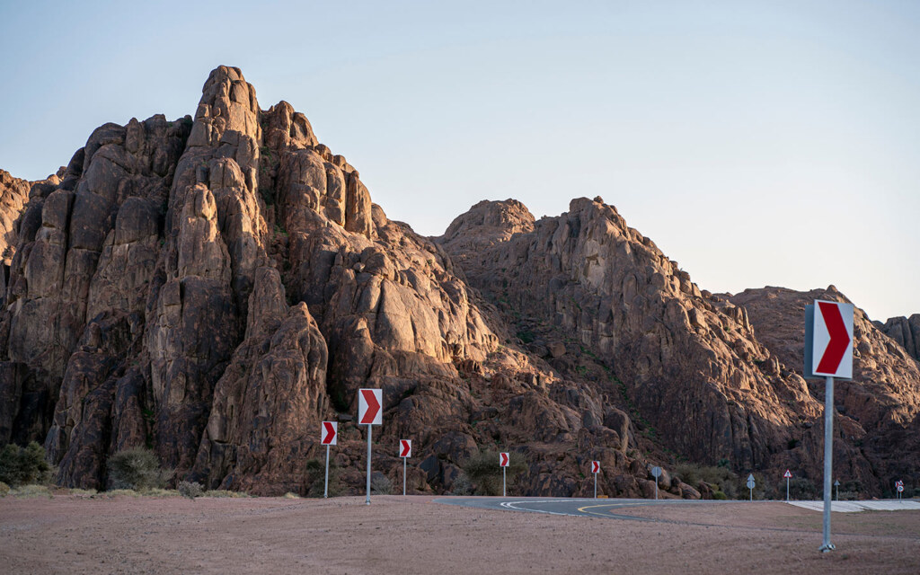 Elements such as road proximity, development type, and urban planning affecting property prices.