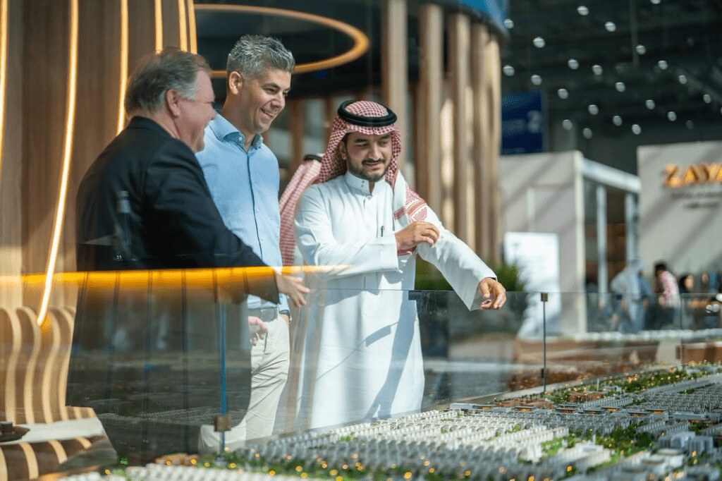 People discussing questions and sharing information in a meeting.