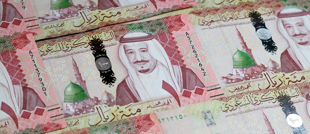 ربط الريال بالدولار